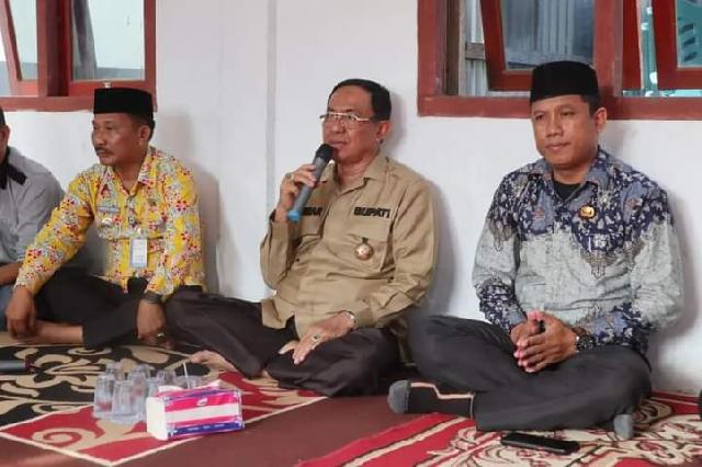Pertemuan Forum RT/RW dan Kades se-Kacamatan Enok, Bupati HM Wardan Harapkan Dukungan Pelaksanaan Program Pemerintah