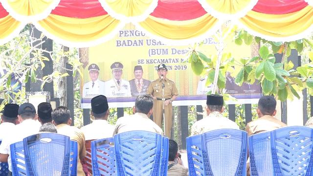 Bupati HM Wardan Kukuhkan BUMDes se Kecamatan Mandah di Pantai Solop